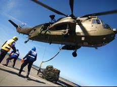 Sea King from 846NAS load lifting HMS Albion