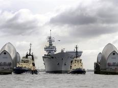 HMS Illustrious passing through the Thames Barrier