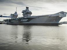 HMS Queen Elizabeth leaves her dock for the first time